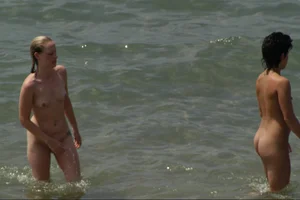 Girls on a nude beach in Sitges, Spain