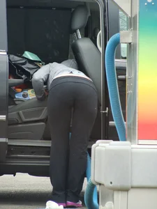 Girls cleaning their cars in jeans and pants