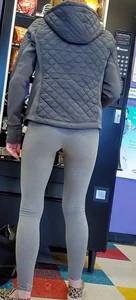 Girl with a great ass in tight grey leggings