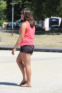 Thick girl in pink top and black shorts with vpl