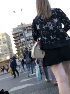 Candid girl wearing a short skirt crossing the street, awesome pale legs