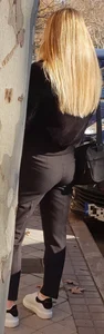 Tiny blonde in black pants