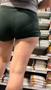Milf doing grocery shopping, shows off her ass