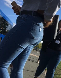 Long haired beauty teen with a tight ass in jeans