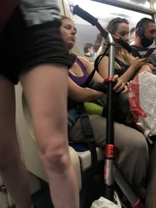 Hot Legs of a Candid Girl in Shorts Standing in a Subway Train Creepshots