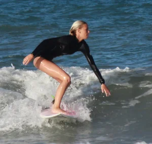 Hot surfer chicks out in the water