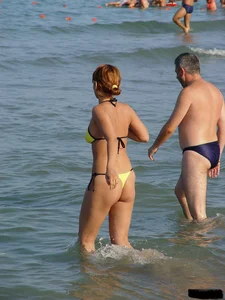 Beach voyeur girls in bikinis, thongs and topless