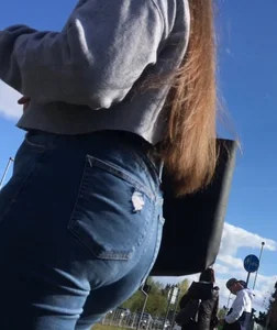 Long haired beauty teen with a tight ass in jeans