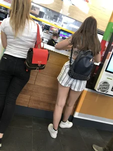 Candid petite teen in shorts fast food restaurant creepshot