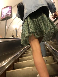 Girl in a Skirt With Thin Legs Standing on a Subway Escalator Low Angle Creepshots Collection