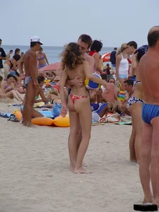 Beach voyeur girls in bikinis, thongs and topless