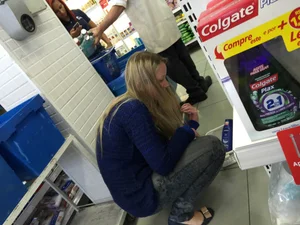 Sexy blonde with a nice ass in tight patterned jeans