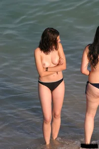 Beach voyeur girls in bikinis, thongs and topless