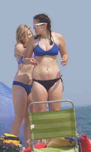 3 girls on the beach in bikinis with big boobs, one brunette and two blondes