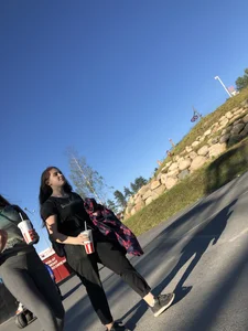 Skinny Girl in Grey Leggings Walking Past the Camera Candid Photos Gallery