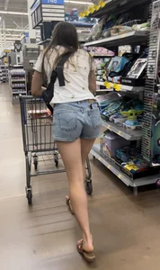 Babe with a  tight ass & long legs in Levi shorts