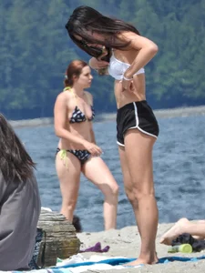 Blondie and two asian girls put on sunscreen (pt 2) [062]