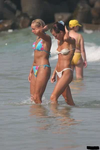 A bunch of sexy beach voyeur babes in bikinis, thongs and topless