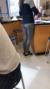Young Girl in Grey Leggings in Classroom Photo