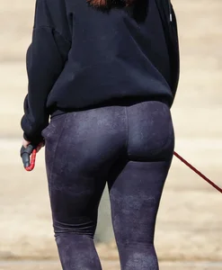 Ass in Purple Leggings