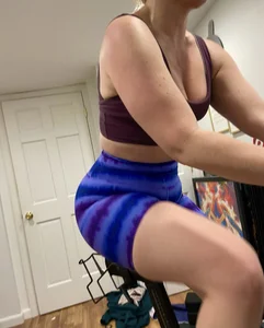 Girls recording themselves working out at home in tight clothes