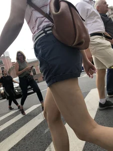 Young Girl in Shorts And Sandals Crossing the Street Gallery