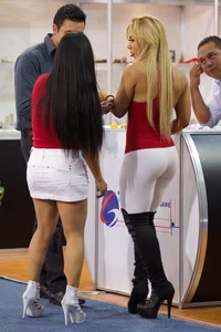 Sexy mature blonde girl in white leggings with a nice full booty and bonus brunette in skirt