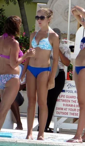 Stills of a beautiful blue eyed bikini babe in blue top