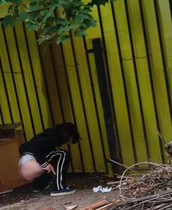 Girl taking a leak outdoors