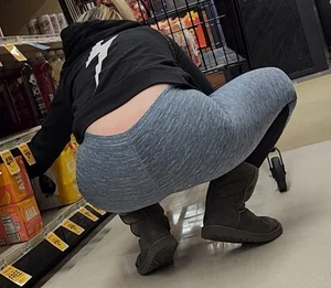 Blonde crouching lower back showing