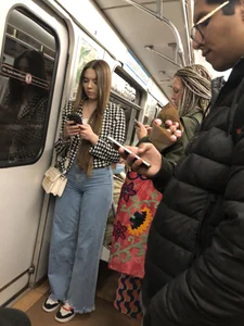 A Cute Candid Girl in Loose Blue Jeans Subway Train Sneaky Photos