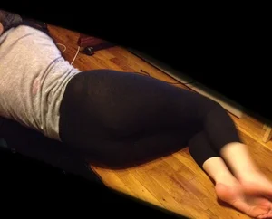 Girl in tights lying on the floor