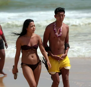 Sexy Asian on the beach with nice boobs and ass