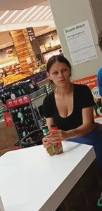MILF w/ cleavage at checkout