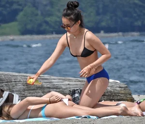 Blondie and two asian girls put on sunscreen (pt 2) [062]