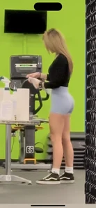 Petite blonde with bubble butt in blue spandex shorts