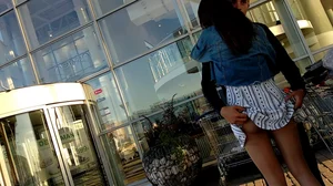 Guy grabbing his girlfriend in a skirt with hot legs street creepshots