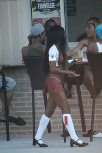 Sexy ebony Tilted Kilt employee in her uniform