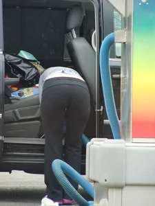 Girls cleaning their cars in jeans and pants
