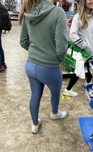 Ass in blue leggings