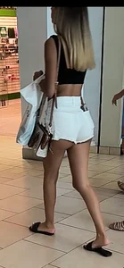 Tan teeen shows off her butt cheeks