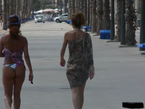 Bunch of sexy babes at the beach in thong bikinis
