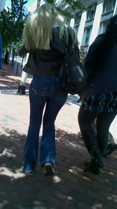 Blonde in tight jeans with her red thong sticking out