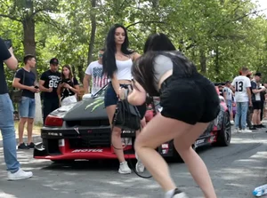 Girls Taking Photos at the Racing Event Candids