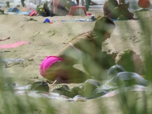 Skinny Candid Girl in a Pink Swimsuit Sitting on Her Knees on the Beach Spy Photo, Nice Lil Ass