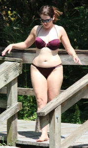 Two big boobed bikini babes in maroon bikinis