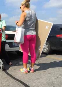 Blondes great ass in pink leggings shopping at Target