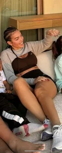 Milf in tight grey jeans and knee high boots with enormous heels, then in swimsuit
