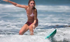 Candid surfer babes on the beach and in bikinis