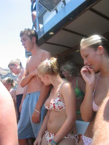Big boobed girl in bikini can't keep her nipples in